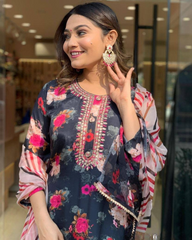 Salwar Love Bloom in Bold: A Dramatic Black Floral Salwar Suit with a Statement-Making Dupatta.