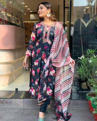 Salwar Love Bloom in Bold: A Dramatic Black Floral Salwar Suit with a Statement-Making Dupatta.