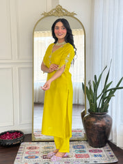 Salwar love Festive Brilliance: Vibrant Yellow Kurta Set with Mirror Work & Rich Purple Sheer Dupatta .