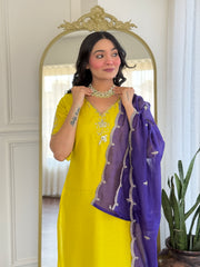 Salwar love Festive Brilliance: Vibrant Yellow Kurta Set with Mirror Work & Rich Purple Sheer Dupatta .