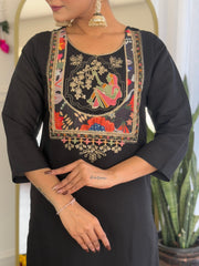 SalwarLove Elegant Floral Printed Georgette Suit with Embroidered Neck and Plain Roman Silk Bottom.