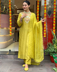 Radiant Charm: Yellow Chanderi Silk Suit with Organza Dupatta.