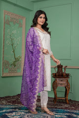 SalwarLove Traditional Roman Silk Kurta Pant Set with Embroidered Neckline and Bandhani Printed Embellished Dupatta Purple White.