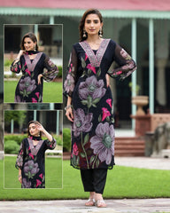 SalwarLove Floral Whisper – Soft Black Suit with Artistic Print and Romantic Neck Embroidery